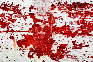 Texture of a concrete wall with cracks and scratches which can be used as a background