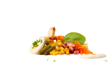 Fresh mixed salad with Chicken, bacon, salad, carrots, bacon, corn, pickle, cherry tomato, egg. Nicely design dressed up horizontally, on white background.