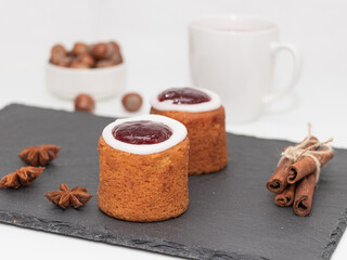 Runeberg Cakes (Runebergin Torttu) - traditional Finnish homemade pastry on a slate board,...