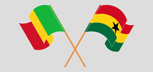 Crossed and waving flags of Mali and Ghana