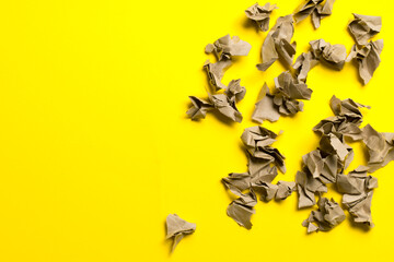 pieces of craft paper on a yellow background. place for text.