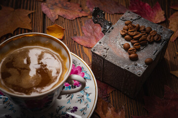 Still life- autumn motif. Breakfast- cup of coffee is on the table