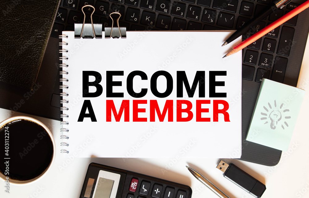 Poster top angle view of pen and notebook written with text become a member.