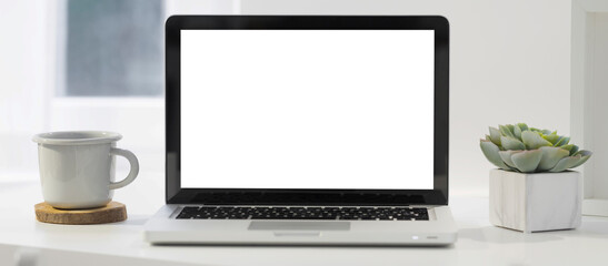 Computer laptop screen at home office desk. Minimalist web banner.
