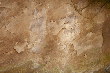 Background of brown stone wall texture. Horizontal image.