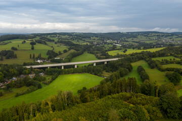 Fototapeta na wymiar Aerial view of a viaduct in the Ardennes, part of the E42 (A27) highway