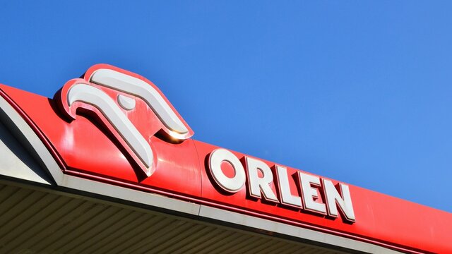 Sign Orlen. Orlen company signboard, logo  PKN Orlen - major Polish oil refiner and petrol retailer company. Warsaw, Poland - October 10 2018