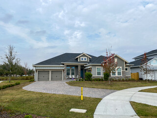 A luxury gray house in the Laureate Park neighborhood