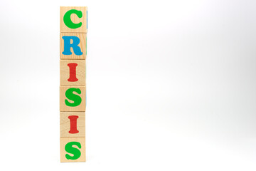 Multicolored cubes on white background word crisis