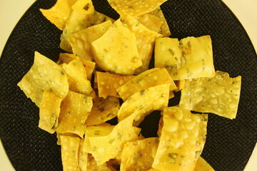 tortilla closeup photo in black plate