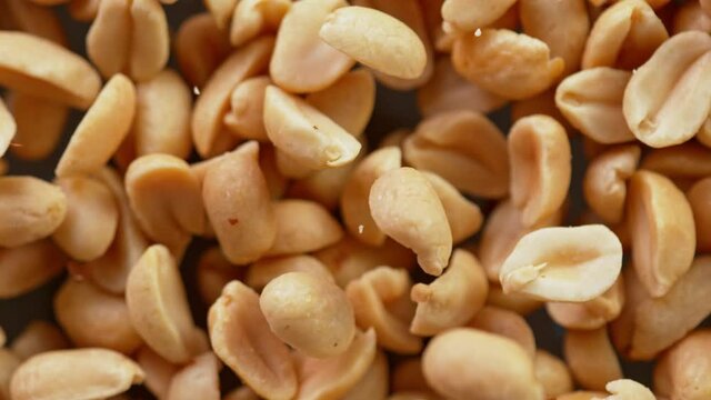 Super Slow Motion Detail Shot of Rotating Peanuts at 1000 fps.