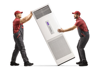 Workers in uniforms installing a self standing portable air conditioning unit
