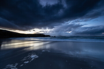 Winter sunset with reflections of clouds on the beach of Las Islas!