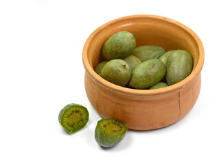 Mini kiwi baby fruit on white background. Kiwi berry isolated on white background.