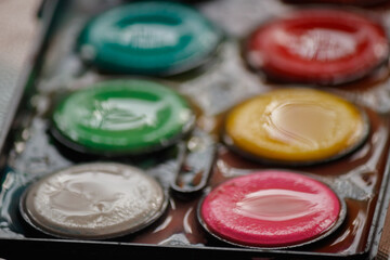 Naklejka premium Using Watercolor Paint