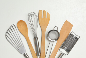Set of cooking utensils on white background, flat lay
