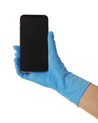 Person in blue latex gloves holding smartphone with blank screen against white background, closeup...