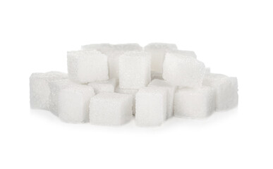 Heap of refined sugar cubes on white background