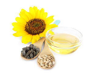 Sunflower, oil in glass bowl and seeds on white background