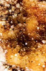 Beautiful yellow and orange crystal magic gem stone. Iridescent natural geometric crystals.