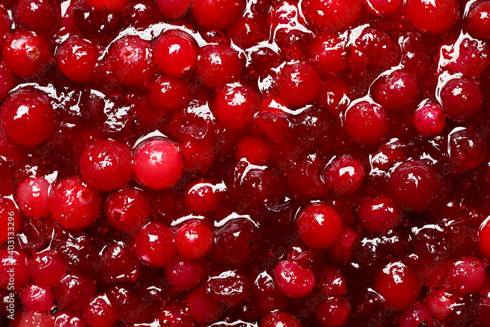 Wall mural fresh juicy cranberry sauce as background, closeup