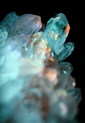 Beautiful blue mystic crystal magic Rhinestone gem stone. Iridescent natural geometric crystals.