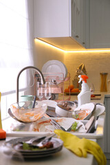 Dirty dishes in kitchen after new year party