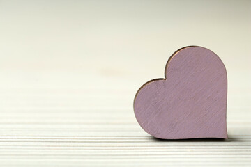 Decorative heart on white background, closeup with