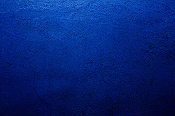 Blue colored abstract wall background with textures of different shades of blue