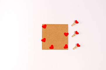 Blank Valentine's Day greeting card with red romantic hearts on white background with copy space.