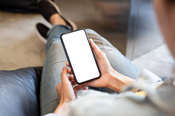 cell phone blank white screen mockup.woman hand holding texting using mobile on desk at office.background empty space for advertise.work people contact marketing business,technology