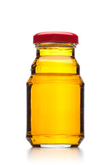 apple juice in a little glass bottle isolated on white background.