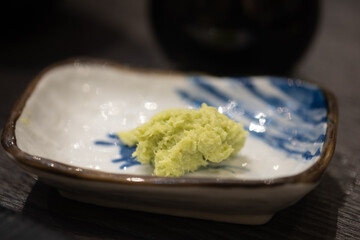 Wasabi sauce in ceramic mini bowl