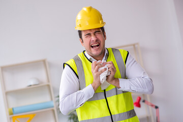 Young male architect working in the office