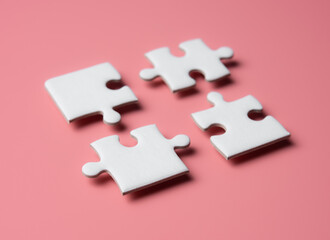Four pieces of a puzzle,solving problems in business,Innovation and teamwork in company.