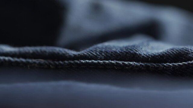 Zooming Macro Shot Of Stitched Seam In Denim Jeans, Manufacturing Designer Fashion