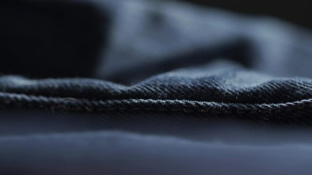 Closeup Shot Of Seam In Blue Denim Fabric During Manufacturing Process Of Designer Clothing