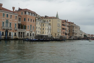 Canal and buildings photo taken in Venice, Italy