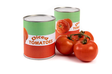 Generic labelled food cans of diced tomatoes with some raw tomatoes isolated on white
