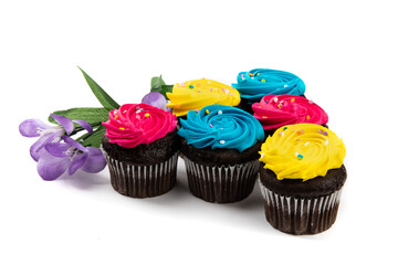 group of colourful Easter cupcakes isolated on white