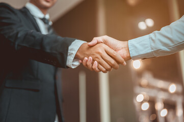 Businessman shake hands and get to know each other before they start talking about...