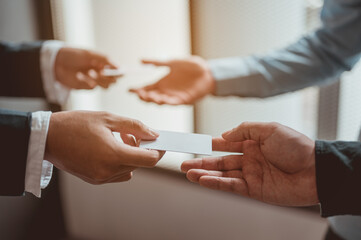 Obraz premium Business card exchange and exchange of communication and collaboration channels.Success Working Successful Concept