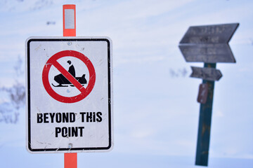 A modern sign shows an area set aside for ono-motorized winter activities in Alaska's Talkeetna Mountains.