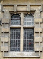 Fototapeta na wymiar old window in a wall with stained glass