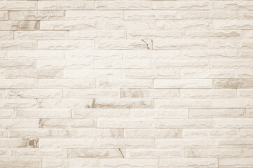 Empty Background of wide cream brick wall texture. Old brown brick wall concrete or stone pattern nature, wallpaper limestone abstract floor/Grid uneven interior rock. Home & office design backdrop.