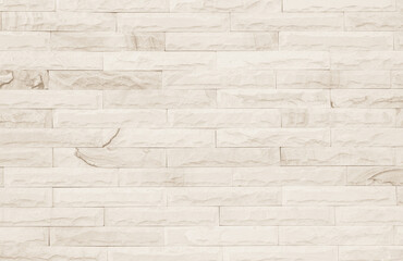 Empty Background of wide cream brick wall texture. Old brown brick wall concrete or stone pattern nature, wallpaper limestone abstract floor/Grid uneven interior rock. Home & office design backdrop.