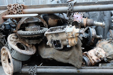 Old car parts store. Place a pile of used car parts.