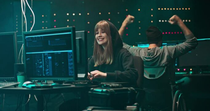 Group of hackers break into the banking system and steal customer data. They are happy with the success and give them a high five. Screemers work in a secret hideout in the center of a large city.