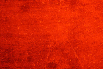 Abstract background of orange color. An empty, flat surface with a fine texture. Blank for a message or the backdrop of a billboard