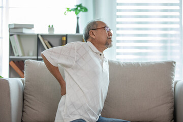 Asian Elderly senior man back pain and illness